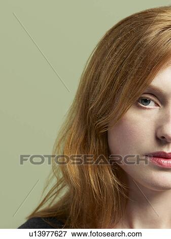 Stock Photo - Mid adult woman close-up of face (cropped). Fotosearch