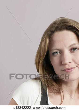 Mid-adult woman close-up View Large Photo Image Stock Image - Mid-adult woman close-up. Fotosearch