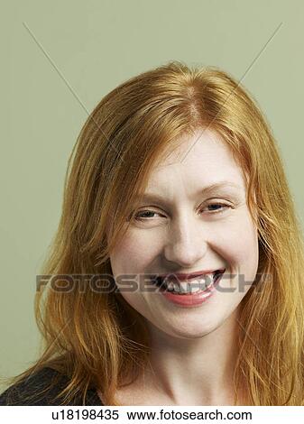 Mid adult woman laughing close-up View Large Photo Image Stock Photography - Mid adult woman laughing close-up. Fotosearch