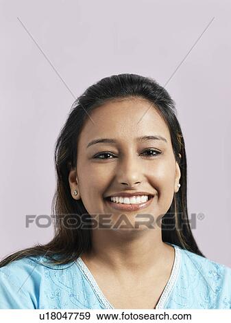 Mid-adult woman smiling View Large Photo Image Stock Photo - Mid-adult woman smiling. Fotosearch