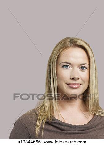Mid adult woman smiling View Large Photo Image Stock Photograph - Mid adult woman smiling. Fotosearch