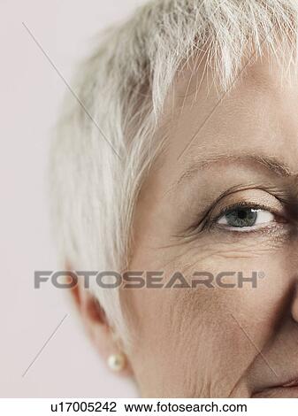 Middle-aged woman close-up of face (cropped) View Large Photo Image Stock Image - Middle-aged woman close-up of face (cropped). Fotosearch