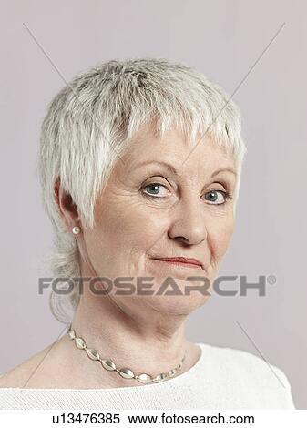 Stock Photography - Middle-aged woman close-up. Fotosearch