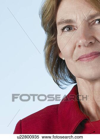 Middle-aged woman smiling close-up View Large Photo Image Stock Photography - Middle-aged woman smiling close-up. Fotosearch