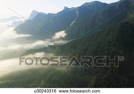 Mist in mountain landscape elevated view View Large Photo Image Stock Photograph - Mist in mountain landscape elevated view. Fotosearch