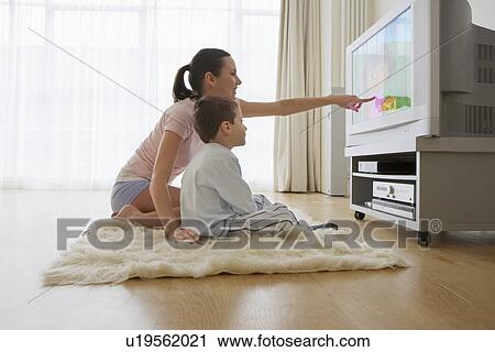 Mother and Son Watching Television View Large Photo Image Stock Image - Mother and Son Watching Television. Fotosearch