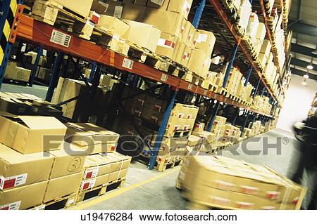 Packages in warehouse View Large Photo Image Picture - Packages in warehouse. Fotosearch