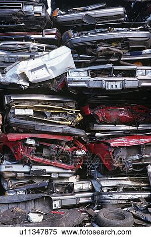 Pile of crushed cars in junkyard full frame View Large Photo Image Stock Photography - Pile of crushed cars in junkyard full frame. Fotosearch