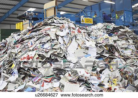 Stock Photo - Pile of recycled paper in factory. Fotosearch