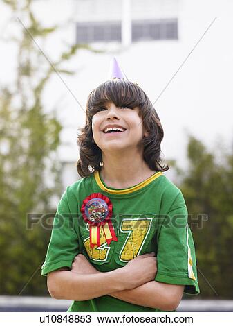 Portrait of boy (10-12) laughing arms crossed View Large Photo Image Stock Image - Portrait of boy (10-12) laughing arms crossed. Fotosearch