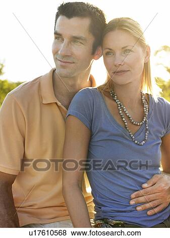 Portrait of couple embracing View Large Photo Image Stock Photo - Portrait of couple embracing. Fotosearch