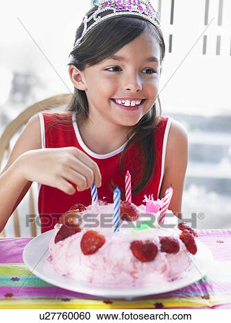 Portrait of girl (7-9) with birthday cake View Large Photo Image Stock Image - Portrait of girl (7-9) with birthday cake. Fotosearch