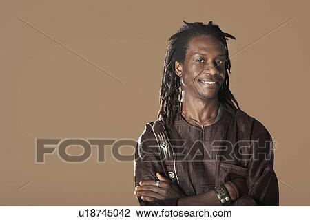 Portrait of mid adult man View Large Photo Image Stock Image - Portrait of mid adult man. Fotosearch