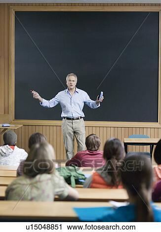 Professor giving a lecture View Large Photo Image Stock Image - Professor giving a lecture. Fotosearch