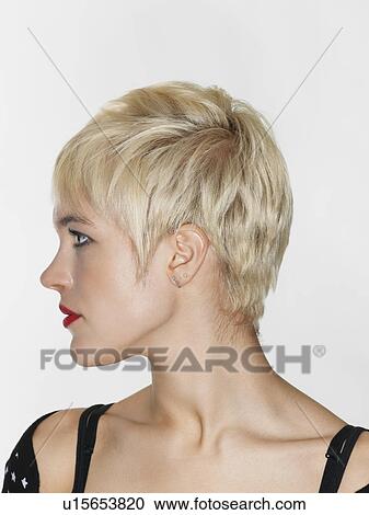 Stock Image - Profile of young woman. Fotosearch