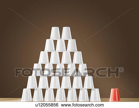 Stock Photograph - Pyramid of white plastic cups on table next to single red cup. Fotosearch
