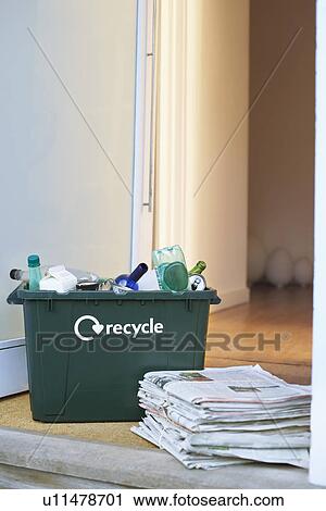 Recycling container and pile of waste paper on floor View Large Photo Image Stock Image - Recycling container and pile of waste paper on floor. Fotosearch