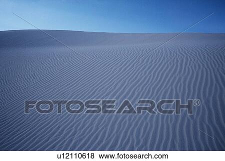 Rippled sand dunes View Large Photo Image Stock Photo - Rippled sand dunes. Fotosearch
