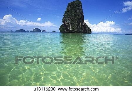 Stock Image - Rock formation in sea. Fotosearch
