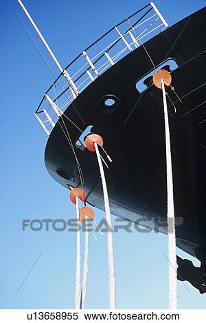 Ropes hanging from ship's bow close-up View Large Photo Image Stock Photography - Ropes hanging from ship's bow close-up. Fotosearch