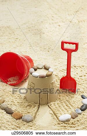 Stock Photography - Sand castle on beach elevated view. Fotosearch