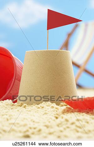 Picture - Sand castle on beach. Fotosearch