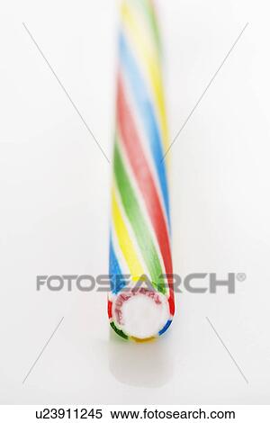 Single stick of rock candy elevated view studio shot View Large Photo Image Stock Photography - Single stick of rock candy elevated view studio shot. Fotosearch