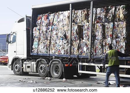 Stock Image - Stacks of recycled paper in lorry. Fotosearch