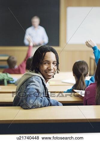 Student in lecture room portrait View Large Photo Image Stock Photo - Student in lecture room portrait. Fotosearch