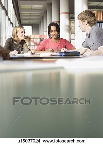 Picture - Students in reading room. Fotosearch