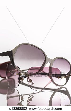 Sunglasses in studio View Large Photo Image Stock Image - Sunglasses in studio. Fotosearch