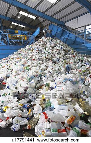 Used plastic bottles on conveyor belt in factory View Large Photo Image Stock Image - Used plastic bottles on conveyor belt in factory. Fotosearch