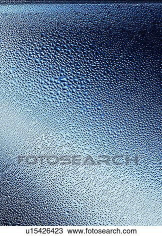 Stock Image - Water drops on Glass. Fotosearch