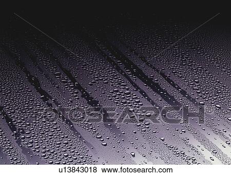 Stock Photo - Water drops running through fog on Glass. Fotosearch