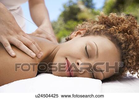 Woman receiving massage head and shoulders eyes closed View Large Photo Image Stock Photography - Woman receiving massage head and shoulders eyes closed. Fotosearch