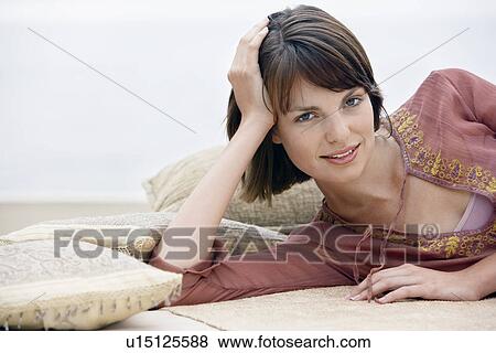 Woman resting by beach portrait View Large Photo Image Stock Photo - Woman resting by beach portrait. Fotosearch