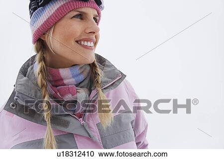 Woman standing on ski slope portrait View Large Photo Image Stock Image - Woman standing on ski slope portrait. Fotosearch