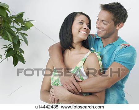 Young Couple Embracing View Large Photo Image Stock Photography - Young Couple Embracing. Fotosearch