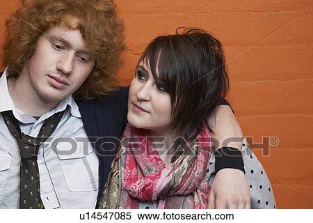 Young couple embracing View Large Photo Image Stock Photography - Young couple embracing. Fotosearch