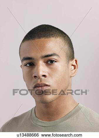 Young man close-up View Large Photo Image Stock Photograph - Young man close-up. Fotosearch
