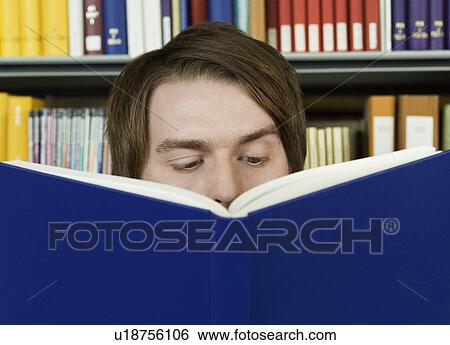 Young man reading View Large Photo Image Stock Photograph - Young man reading. Fotosearch