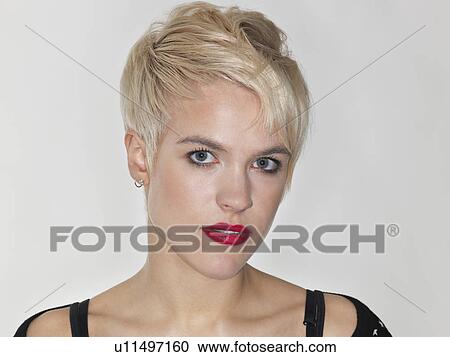 Young woman close-up View Large Photo Image Stock Image - Young woman close-up. Fotosearch