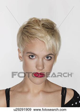 Stock Photo - Young woman close-up. Fotosearch