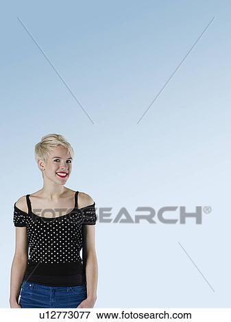 Young woman laughing View Large Photo Image Stock Photo - Young woman laughing. Fotosearch