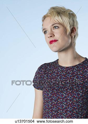 Picture - Young woman looking away. Fotosearch