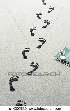 Black footprints on carpet View Large Photo Image Stock Image - Black footprints on carpet. Fotosearch