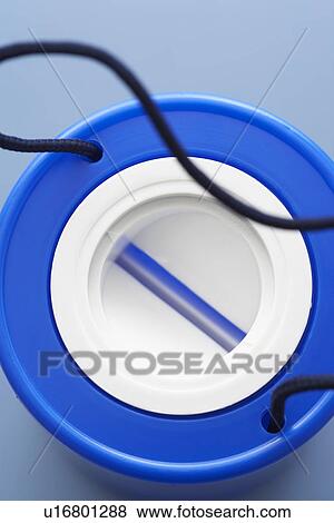 Stock Photo - Blue plastic money box view from above. Fotosearch