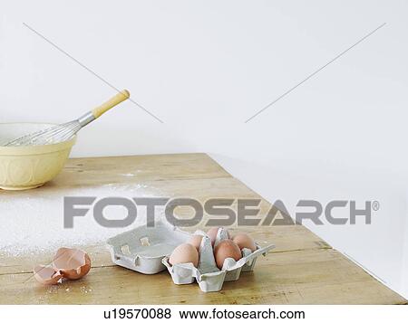 Bowl eggs and flour scattered on table View Large Photo Image Stock Photo - Bowl eggs and flour scattered on table. Fotosearch