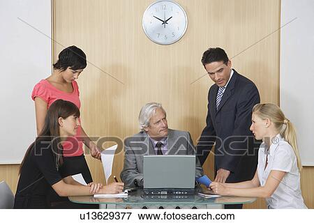 Business people having meeting in conference room View Large Photo Image Stock Photo - Business people having meeting in conference room. Fotosearch