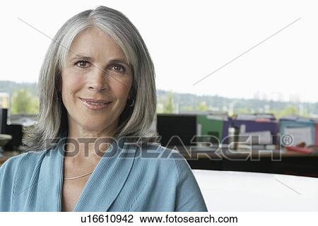 Business woman in office portrait View Large Photo Image Stock Image - Business woman in office portrait. Fotosearch
